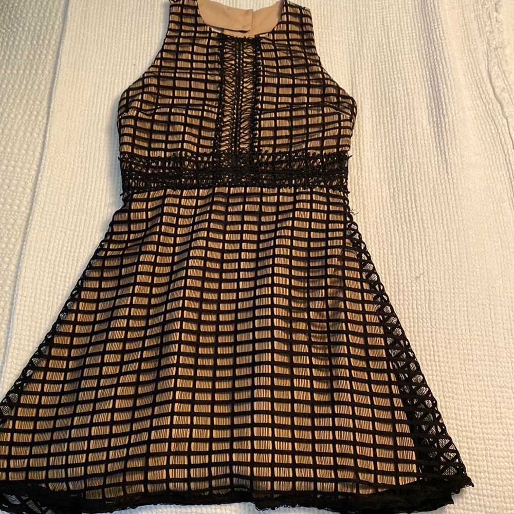 Very cute Black lace dress with awesome back.
